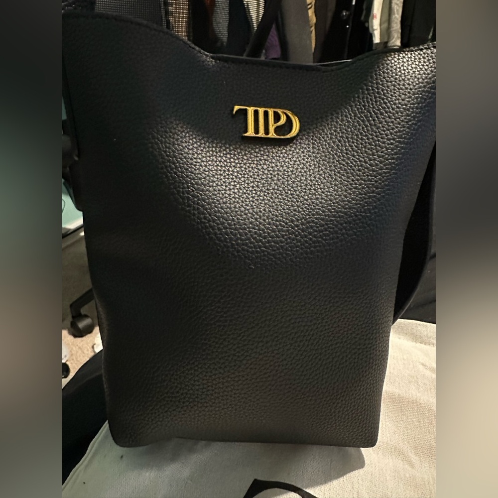 Taylor Swift TTPD purse. Black leather, gold accents. Dust bad. Brand new.